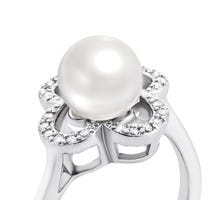 Серебряное кольцо с жемчугом и фианитами (PSS0312R): купить
